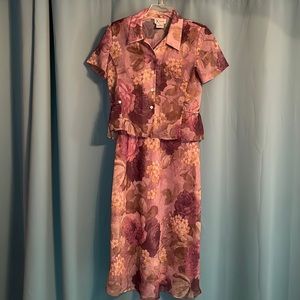 Purple floral sleeveless dress with matching jacket.